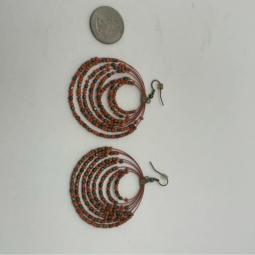 Coral and copper bead multi strand round drop earrings.